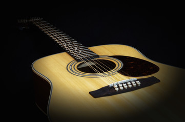 Classic acoustic twelve strings guitar sunburst color top from spruce with cutaway fragment...