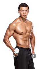 Fototapeta na wymiar Young bodybuilder with dumbbells. Handsome smiling strong athletic man training with dumbbells