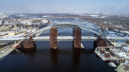 Rusty unfinished bridge in Kiev, Ukraine. Combined car and subway bridge under construction.