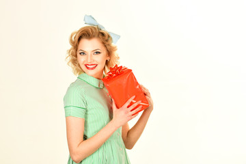 Portrait of beautiful young happy smiling woman in pin-up style