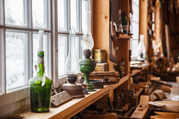 Old traditional carpenter's workshop with its wealth of tools and wood.