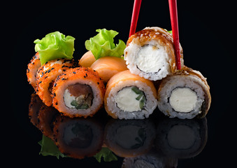 Japanese rolls on a dark background