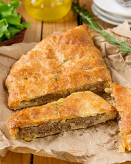 Meat pie with puff pastry, minced beef and potatoes