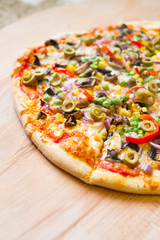 delicious vegetarian pizza on wood