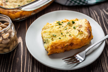 Shepherd's pie on a wooden background