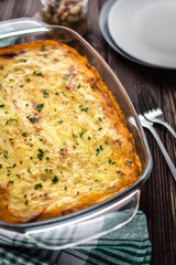 Shepherd's pie on a wooden background