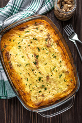 Shepherd's pie on a wooden background
