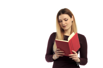 An isolated shot of a beautiful woman reading a book