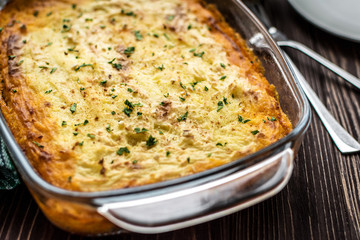 Shepherd's pie on a wooden background