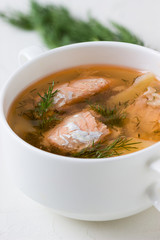 Salmon soup in a saucepan.