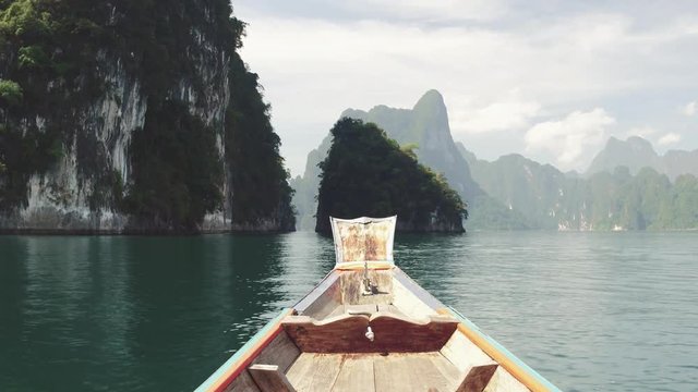 Cinematic POV view of Beautiful thai mountains and sea landscape. Phi phi island view from the long tail boat