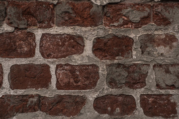 Old brick masonry in close-up view - vintage background