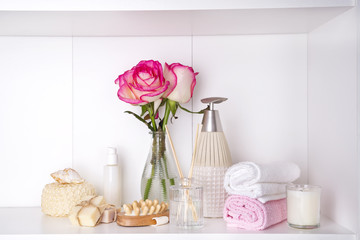 Obraz na płótnie Canvas Spa bath cosmetic and flower rose, isolated on white
