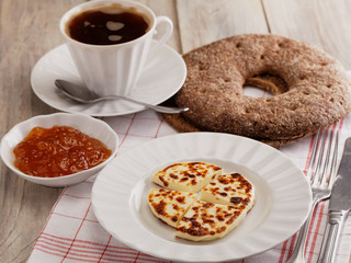 Cheese, cloudberry jam, and coffee