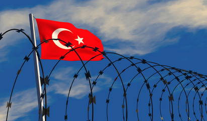 3D illustration of a Turkish flag waving on a flagpole with razor wire in the foreground; depicting security and barriers between nations.