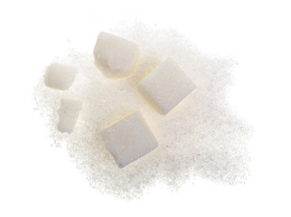 Heap of granulated sugar with cube isolated on white background. Top view. Flat lay