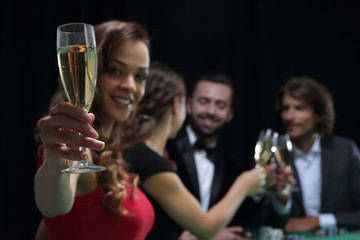 Girl drinking cocktail in casino