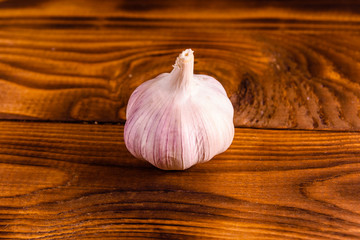 Ripe garlic on a rustic wooden table