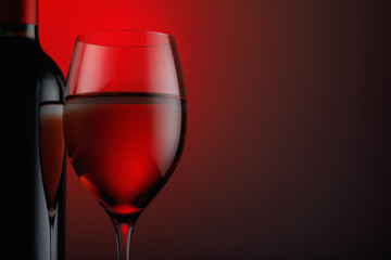 Glass and bottle of red wine on a dark background with space for text, close-up