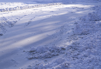 snow cover on the frozen lake at winter morning. background, nature.