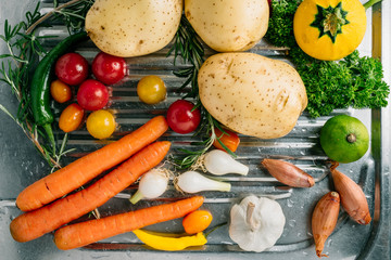 Spring vegetables, start preparing food, washed vegetables and herbs. Homemade food preparation.