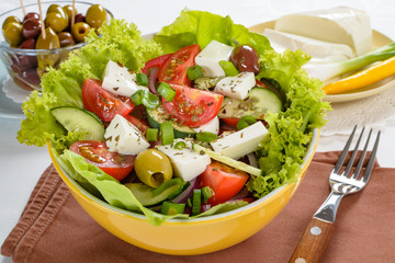 Greek salad with feta and tasty selection of vegetables.
