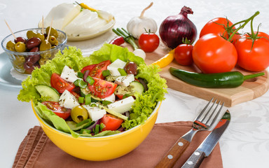 Greek salad with feta and tasty selection of vegetables.