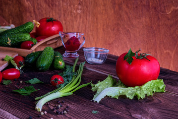 A vegetables on old wooden background.