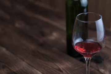 Glass and bottle of red wine