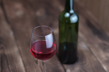 Glass and bottle of red wine