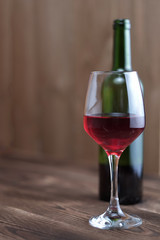Glass and bottle of red wine