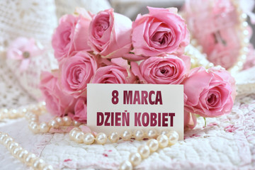 Obraz na płótnie Canvas bunch of pink roses with greeting card for Women Day in Poland