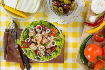 Tuna salad and tasty selection of vegetables.