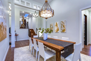 New custom built home boasts spacious dining area with high ceiling