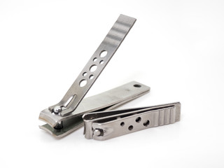 Nail scissors are placed on a white background.