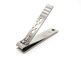 Nail scissors are placed on a white background.