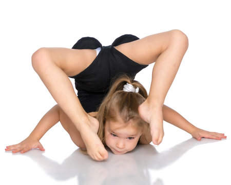 13 year old girl in gymnastics poses Stock Photo | Adobe Stock