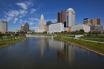 Fototapeta na wymiar Columbus, Ohio was built along the Scioto River in the downtown district. The Scioto Mile includes a path for recreation in this urban riverfront setting.