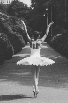  ballerina black and white posing in the park
