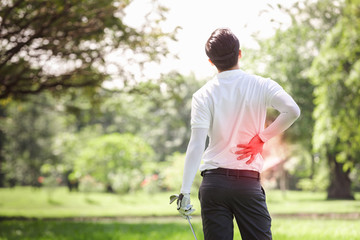 Asian sport young man accident ache back body injury play action goft, Muscle injury concept.