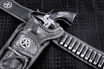 Cowboy 45 Pistol and Holster in black and white