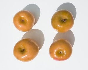top view of four ripe Granny Smith apples