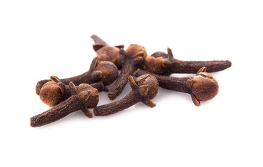 dry cloves on white background