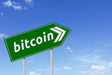Green signpost with bitcoin word