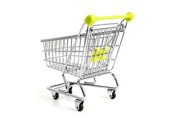 Green shopping cart on studio