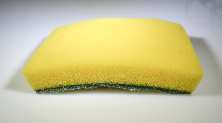 Yellow spong with green scrubber