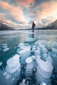 Frozen bubbles in the ice on Abraham Lake, Canadian Rockies