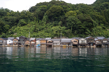 Fototapeta na wymiar Ancient Fisherman Village on a cloudy day at Ine Boathouse of Kyoto, JAPAN.