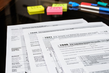 Obraz premium Form 1040 Individual Income Tax return form. United States Tax forms 2016/2017. American blank tax forms. Tax time.