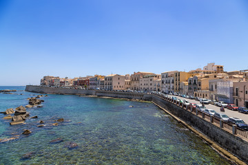 Fototapeta premium Syracuse, Italy. Quay on the island of Ortygia in sunny weather